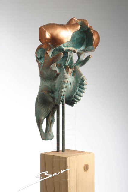 Sculpture of a skull of a bull with the appearance of the torso of a woman