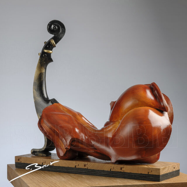 Surrealistic sculpture combining a violin and a woman in one shape, titled Miss Chief